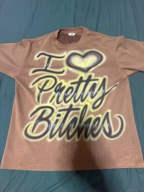 Uniqlo Brown Kids Short Sleeve Tee with Yellow & Black Graphic